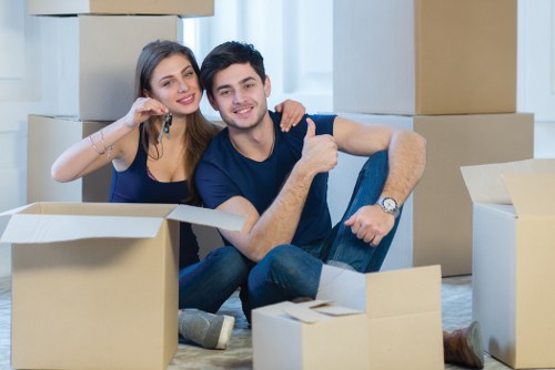 Professional office movers handling business equipment