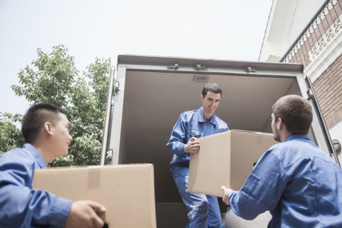 Customer service representative assisting a client at Finchley storage