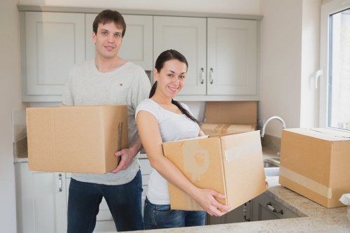 Professional movers handling furniture